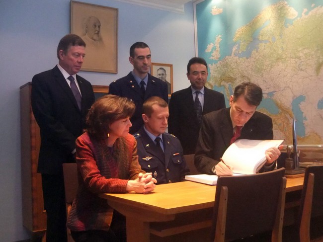 Signing the guest book in Gagarin s office pillars