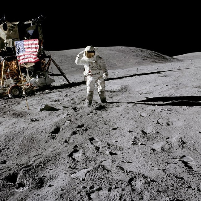 720px-Lunar Module Pilot Charles Duke salutes the flag